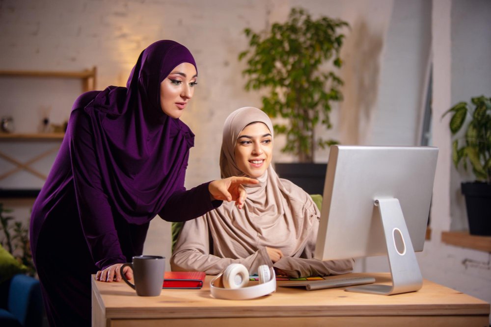 happy-muslim-woman-home-during-online-lesson happy-muslim-woman-home-during-online-lesson