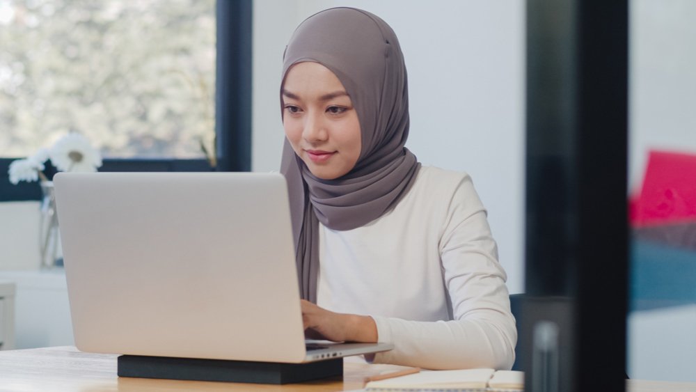 beautiful-asian-muslim-lady-casual-wear-working-using-laptop-modern-new-normal-office beautiful-asian-muslim-lady-casual-wear-working-using-laptop-modern-new-normal-office